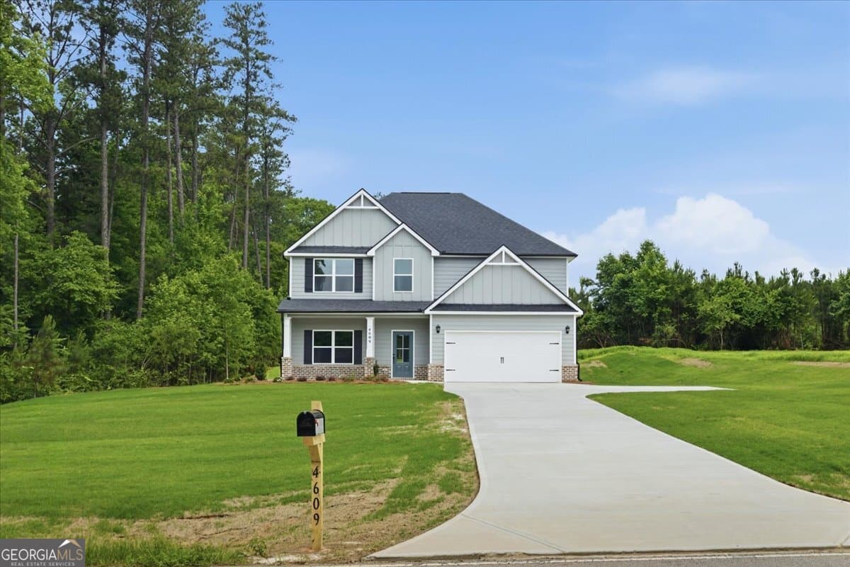5 bedroom, 3 bathroom, 2,673 sq ft single family residence for sale at 4609 Rex Road, Stockbridge, GA 30281 — photo 1 of 38