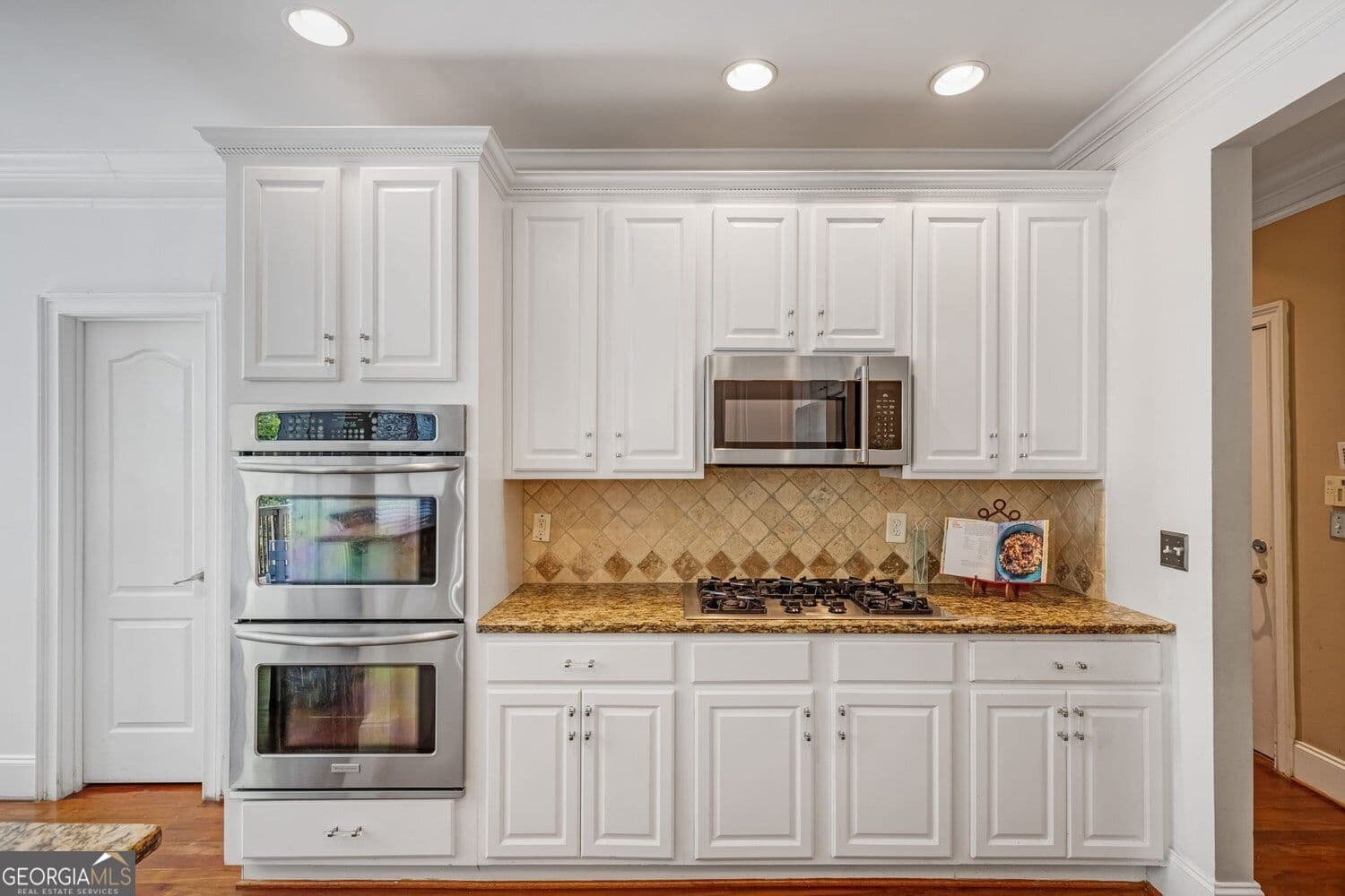 6 bedroom, 3 bathroom, 4,583 sq ft single family residence for sale at 4024 Herron Trail, Atlanta, GA 30349 — photo 8