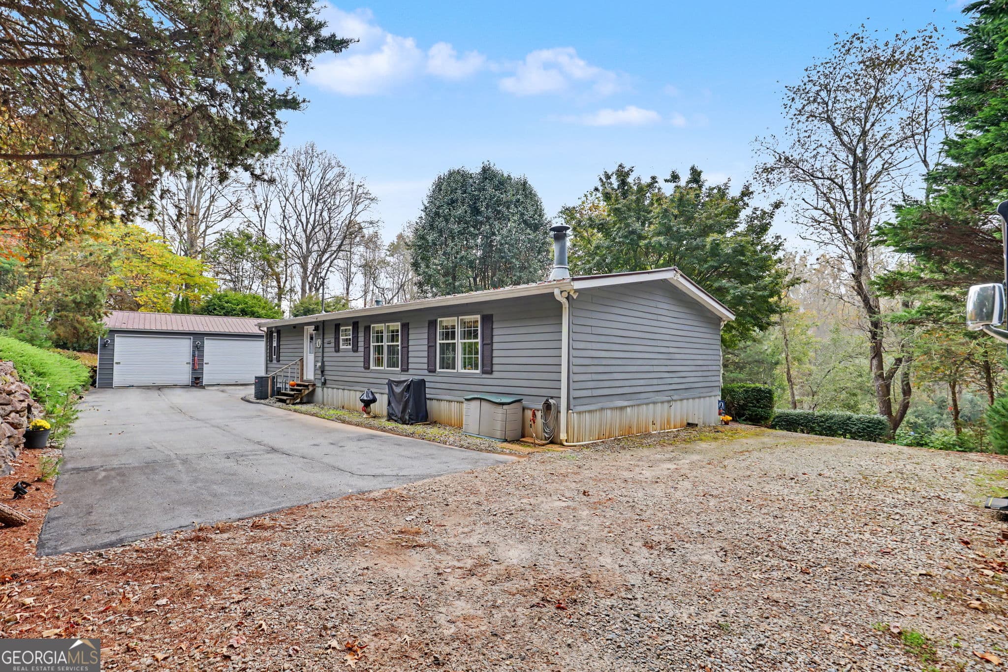 3 bedroom, 2 bathroom, 1,593 sq ft manufactured home,single family residence for sale at 124 Spring Valley Lane, Otto, NC 28763 — photo 1 of 79