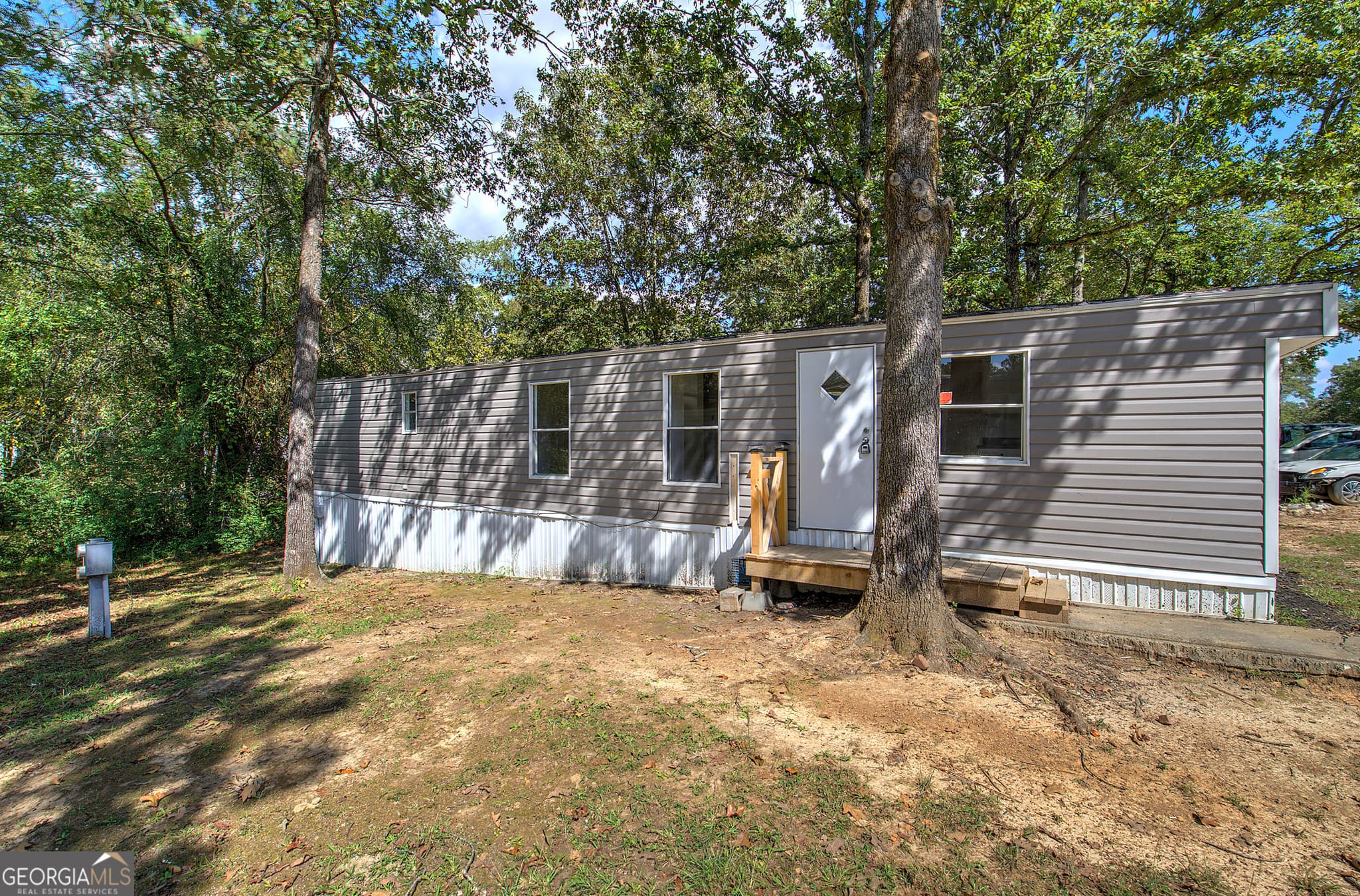 2 bedroom, 1 bathroom, 580 sq ft manufactured home,single family residence for sale at 127 Rising Fawn Trail, Rome, GA 30165