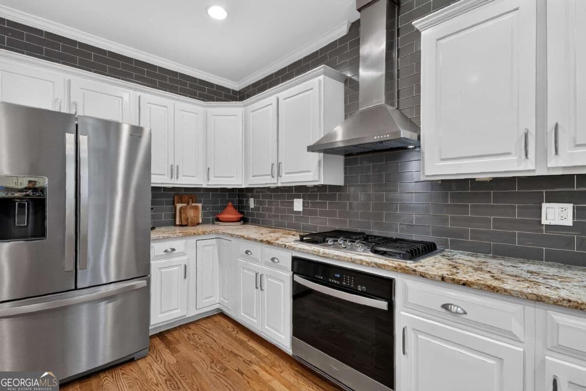 5 bedroom, 3.5 bathroom, 4,452 sq ft single family residence for sale at 2540 Woodbrook Court, Lawrenceville, GA 30043 — photo 9