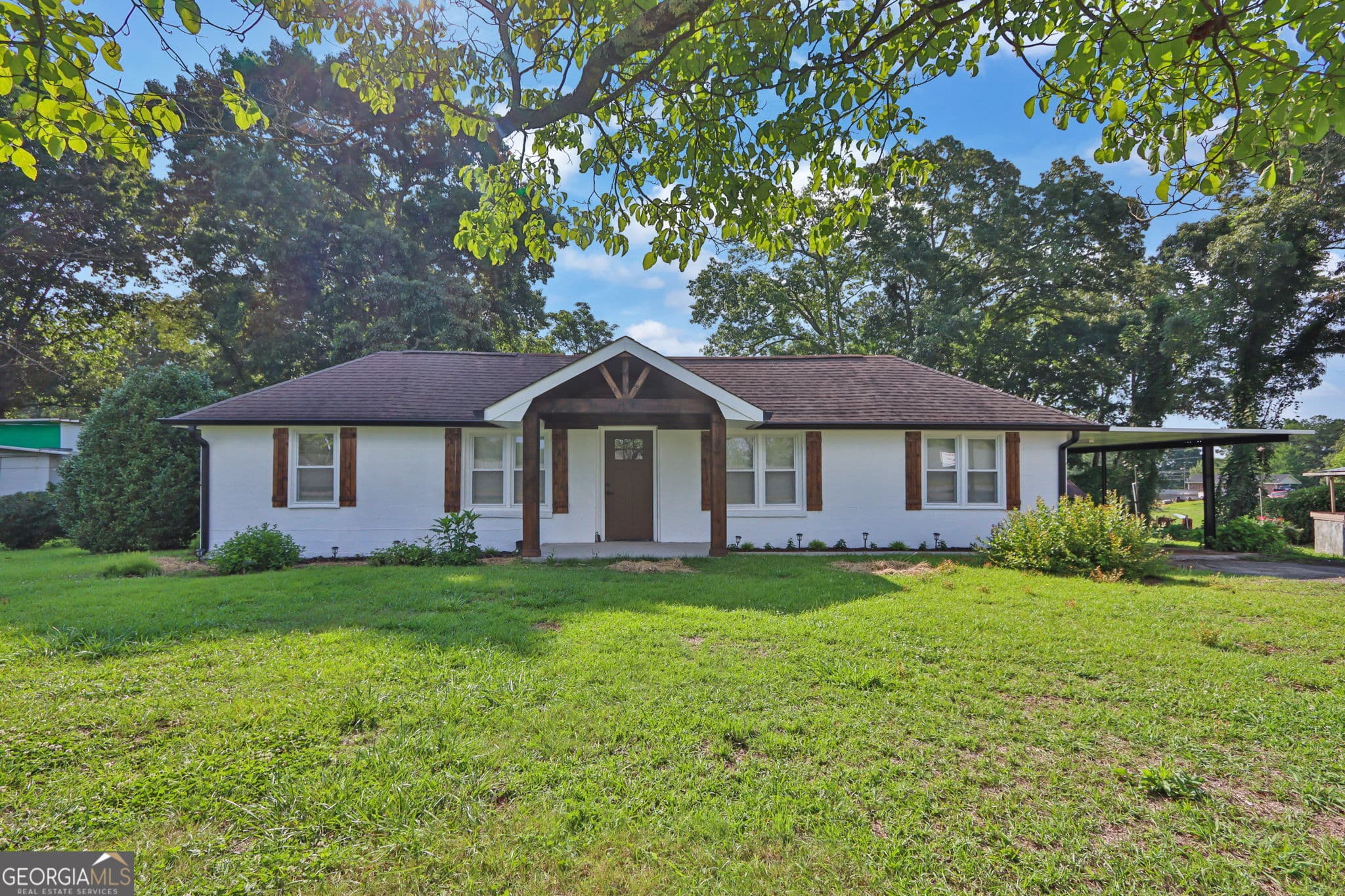 4 bedroom, 2 bathroom, 1,674 sq ft single family residence for sale at 123 Cowan Road, Covington, GA 30016 — photo 2