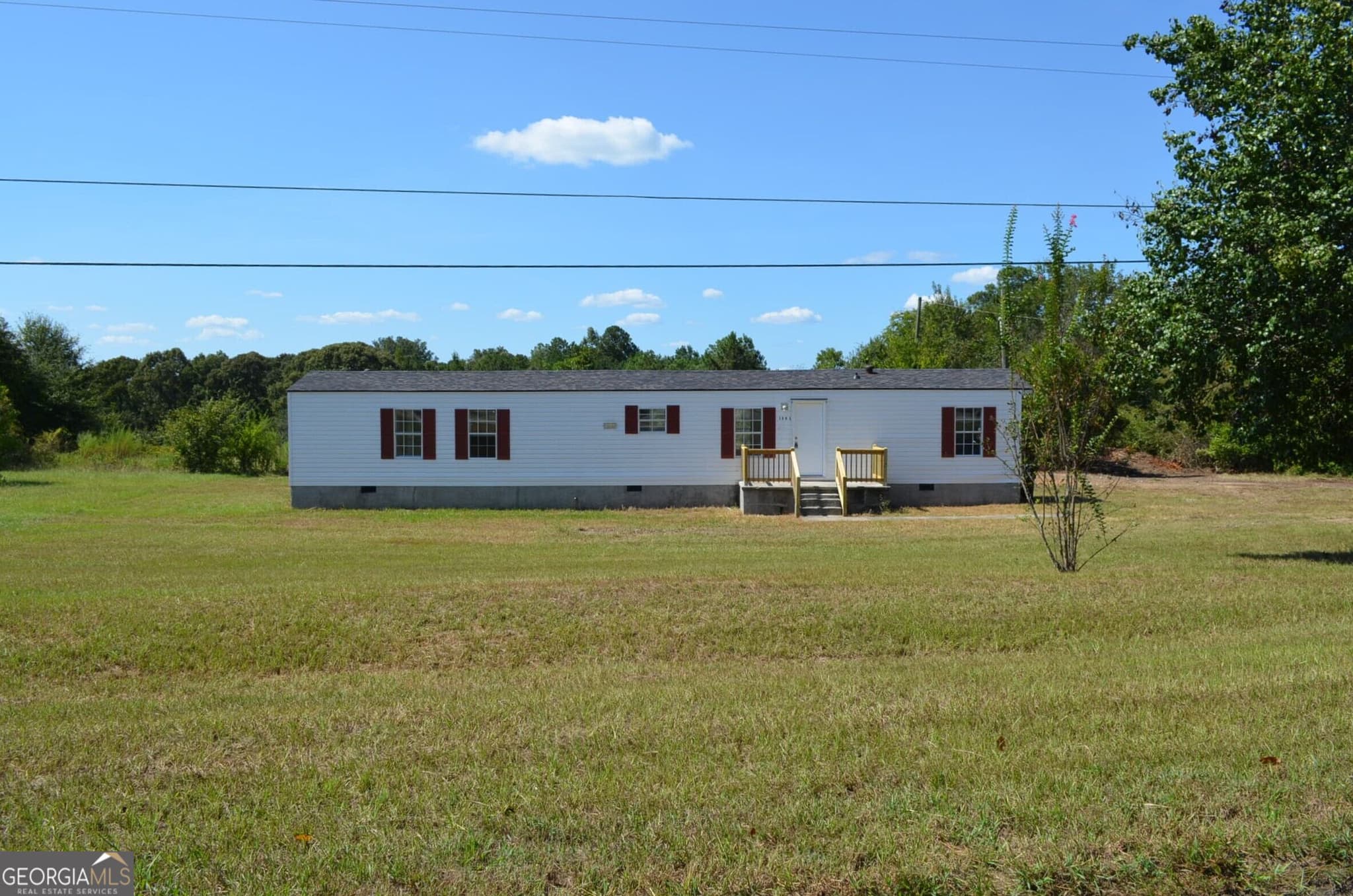 2 bedroom, 2 bathroom, 784 sq ft manufactured home,single family residence for sale at 1805 Jordan Road, Byron, GA 31008 — photo 1 of 11