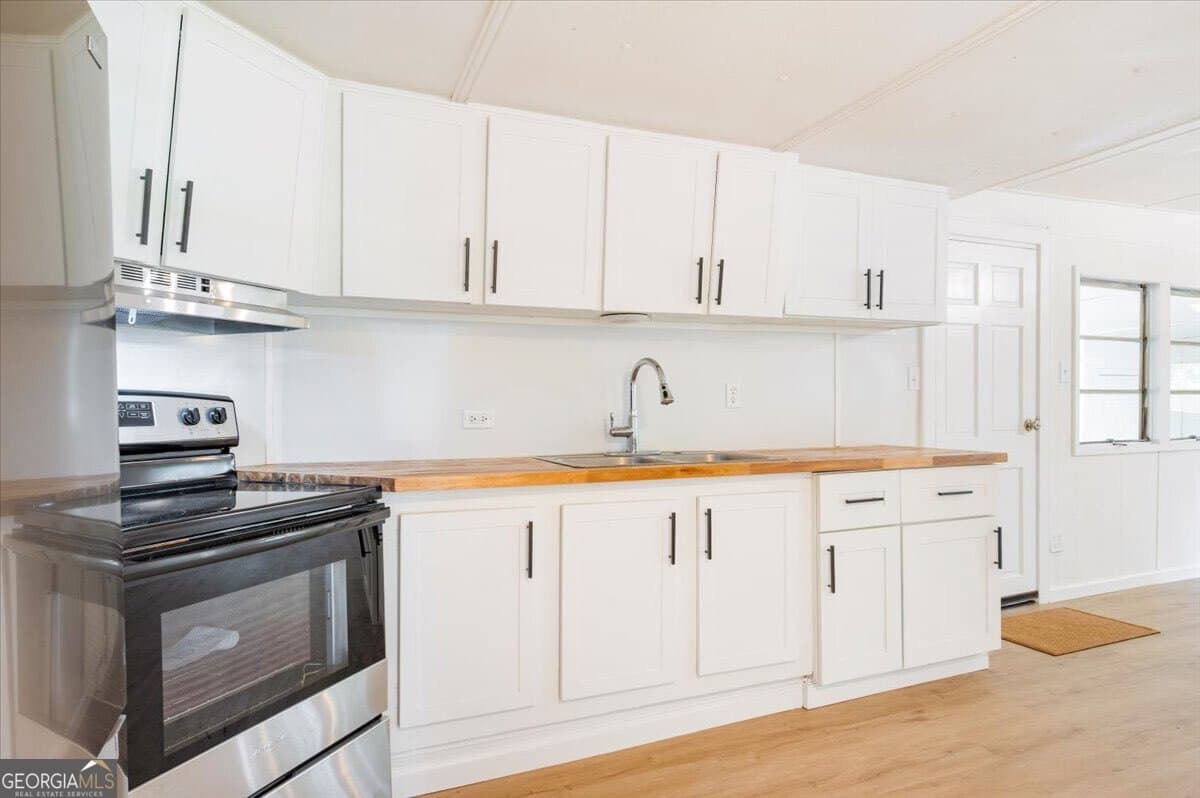 4 bedroom, 3 bathroom, 1,150 sq ft manufactured home,single family residence for sale at 24 Sangster Road, Jesup, GA 31545 — photo 2