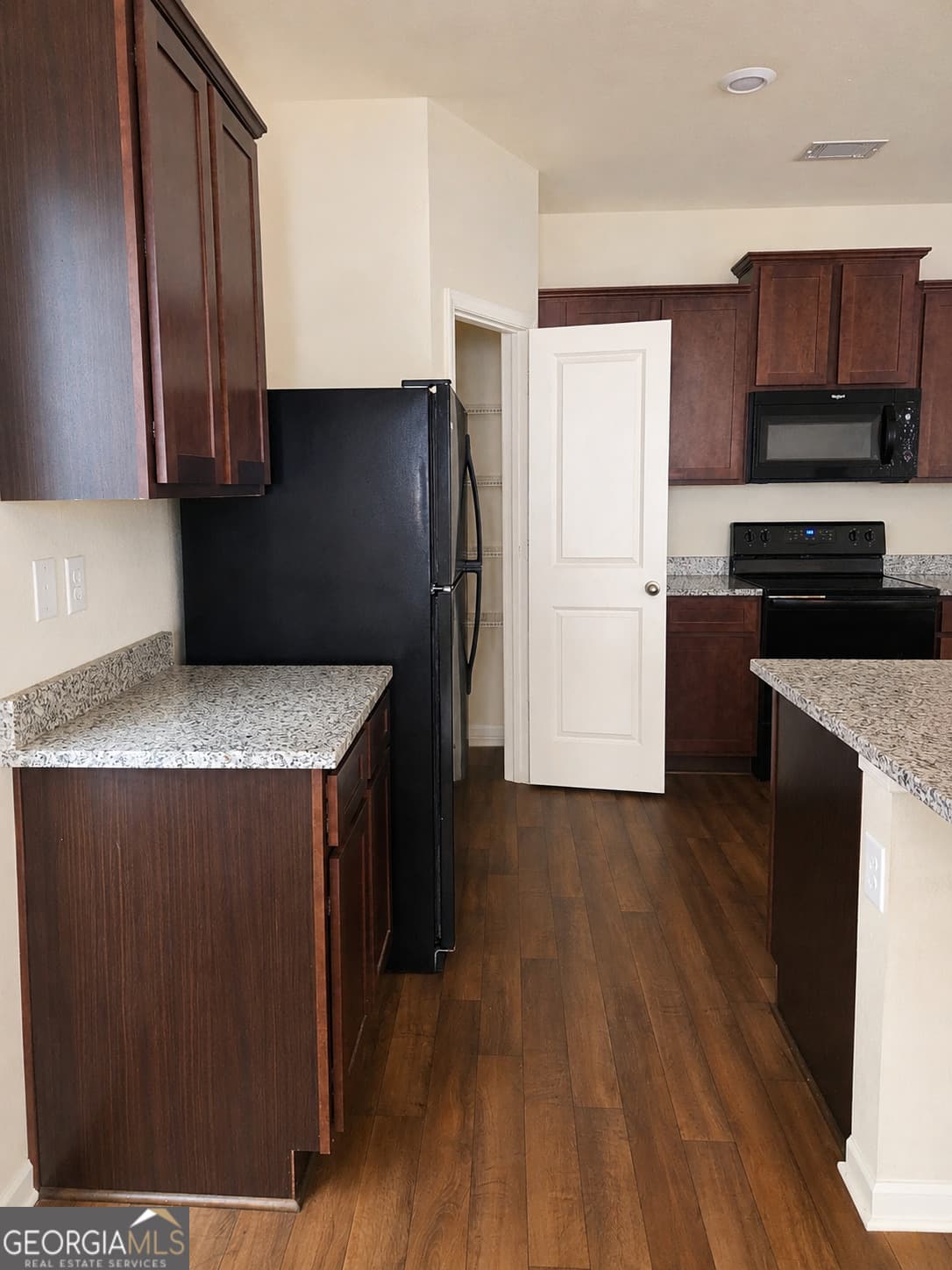 4 bedroom, 2.5 bathroom, 2,076 sq ft single family residence for sale at 10855 Wheeler Trace, Hampton, GA 30228 — photo 4