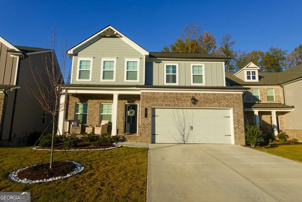 5 bedroom, 3 bathroom, 2,290 sq ft single family residence for sale at 573 Auburn Crossing Drive, Auburn, GA 30011 — photo 2