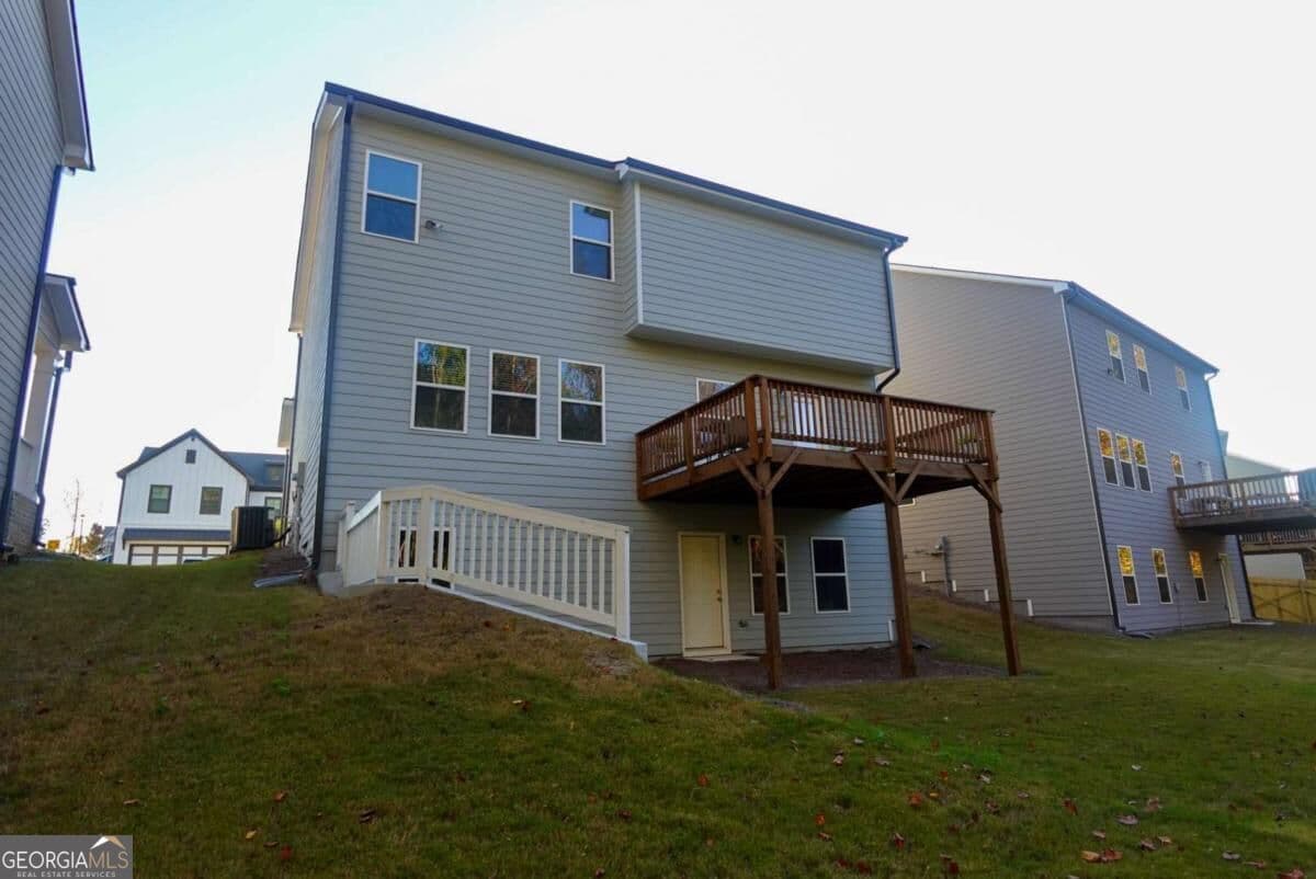 5 bedroom, 3 bathroom, 2,290 sq ft single family residence for sale at 573 Auburn Crossing Drive, Auburn, GA 30011 — photo 6