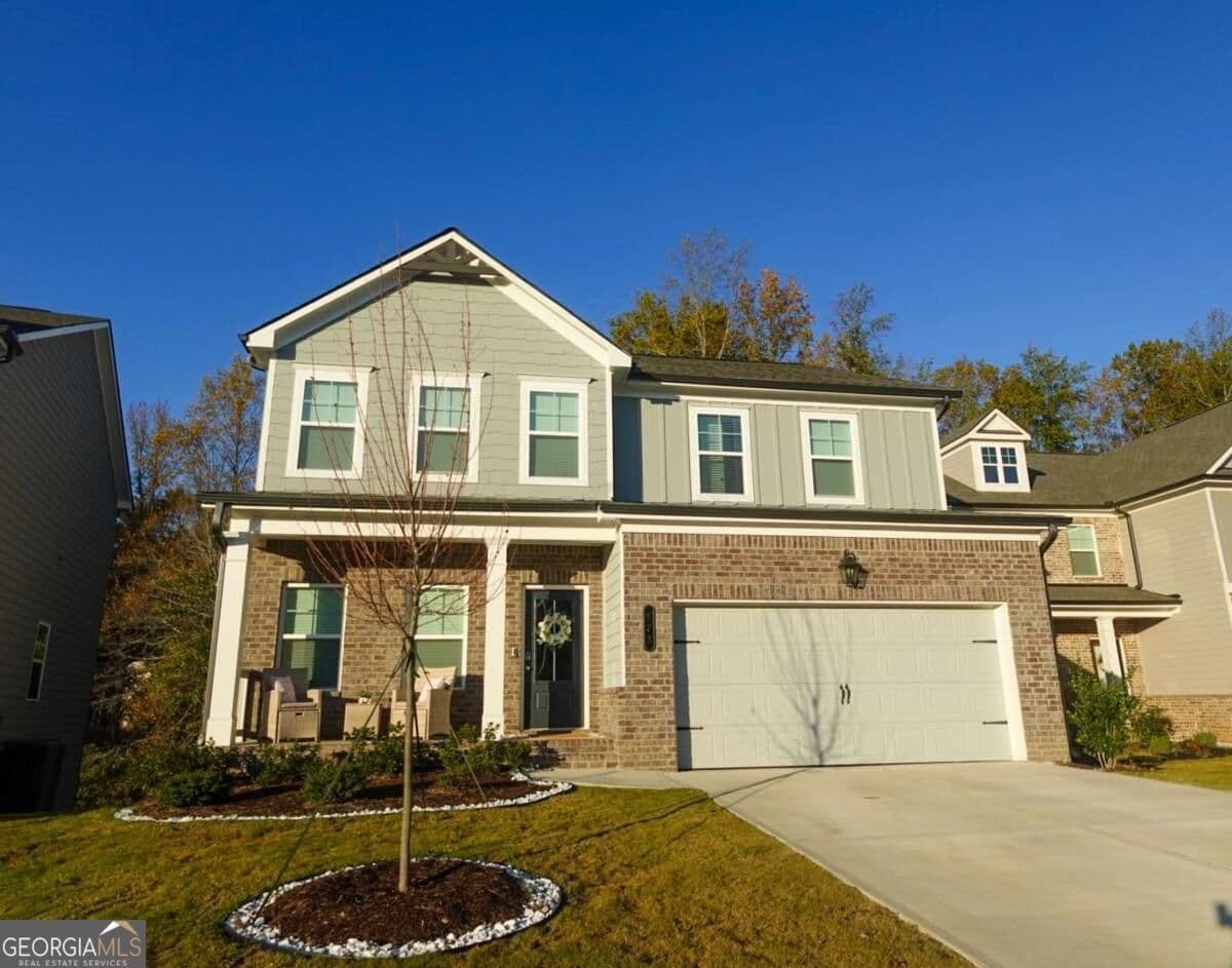 5 bedroom, 3 bathroom, 2,290 sq ft single family residence for sale at 573 Auburn Crossing Drive, Auburn, GA 30011