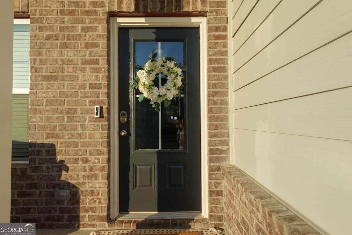 5 bedroom, 3 bathroom, 2,290 sq ft single family residence for sale at 573 Auburn Crossing Drive, Auburn, GA 30011 — photo 5