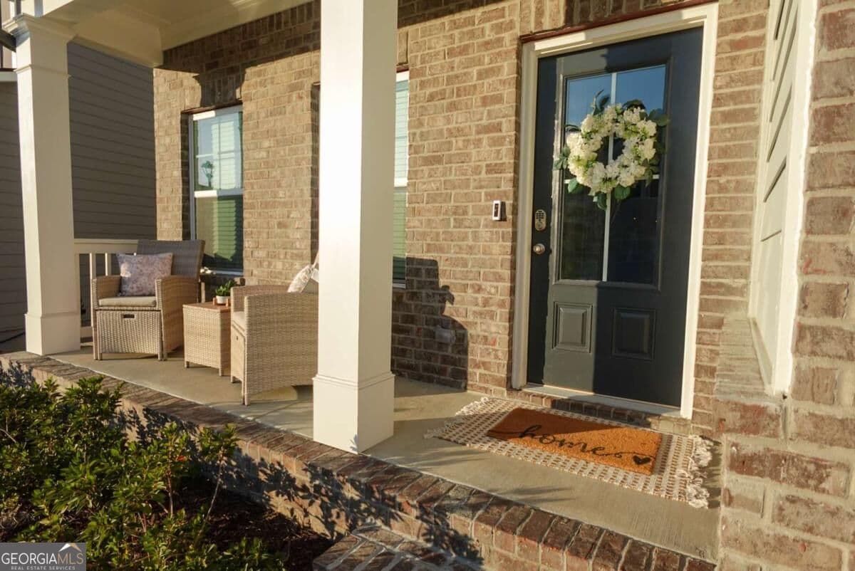 5 bedroom, 3 bathroom, 2,290 sq ft single family residence for sale at 573 Auburn Crossing Drive, Auburn, GA 30011 — photo 4