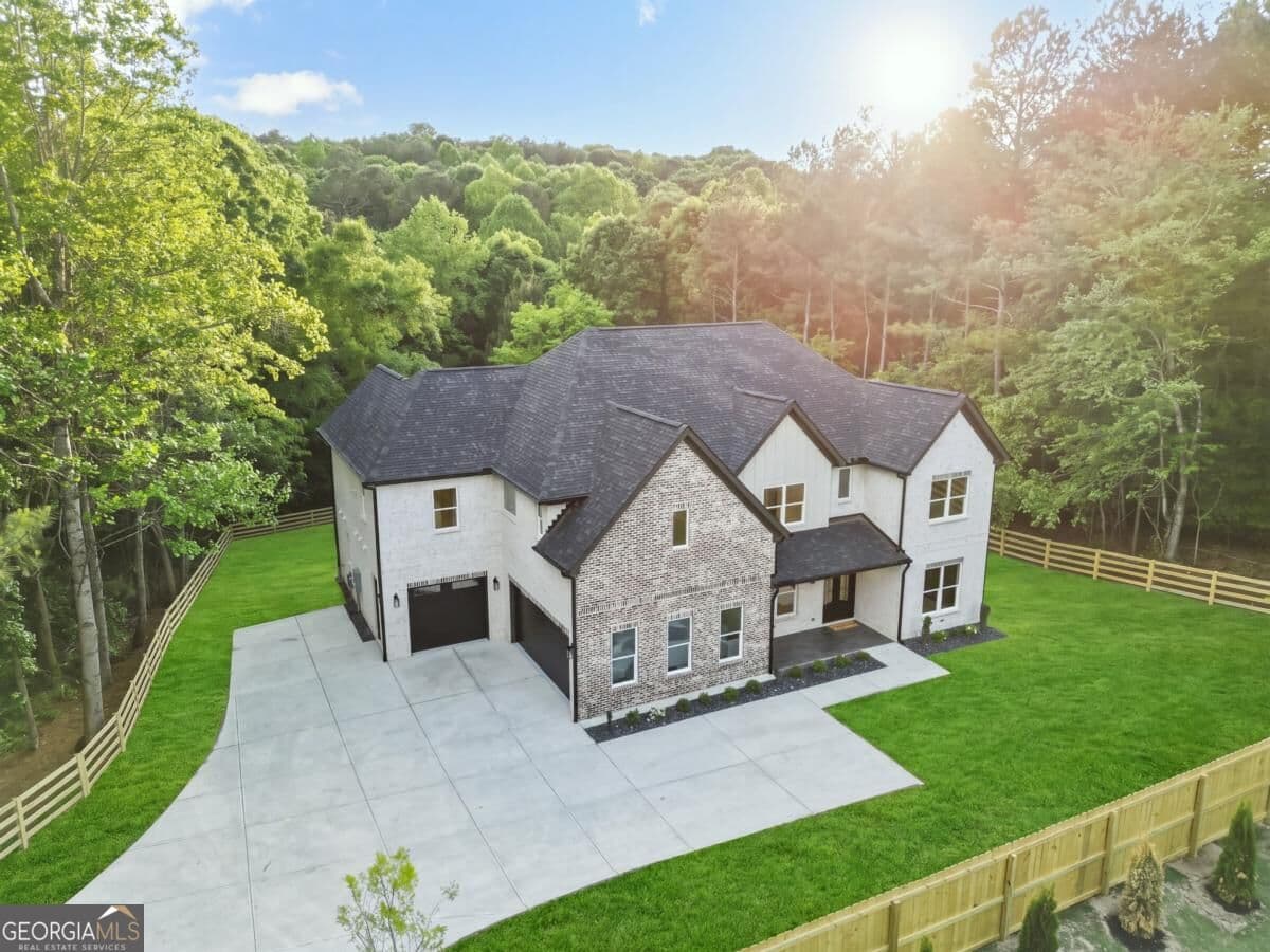4 bedroom, 4.5 bathroom, 5,200 sq ft single family residence for sale at 3461 Callie Still Road, Lawrenceville, GA 30045 — photo 2