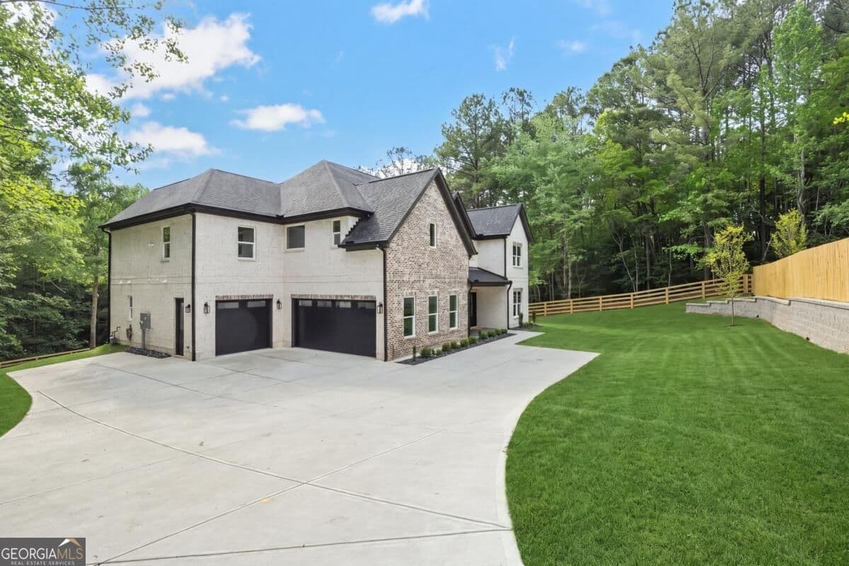4 bedroom, 4.5 bathroom, 5,200 sq ft single family residence for sale at 3461 Callie Still Road, Lawrenceville, GA 30045 — photo 6