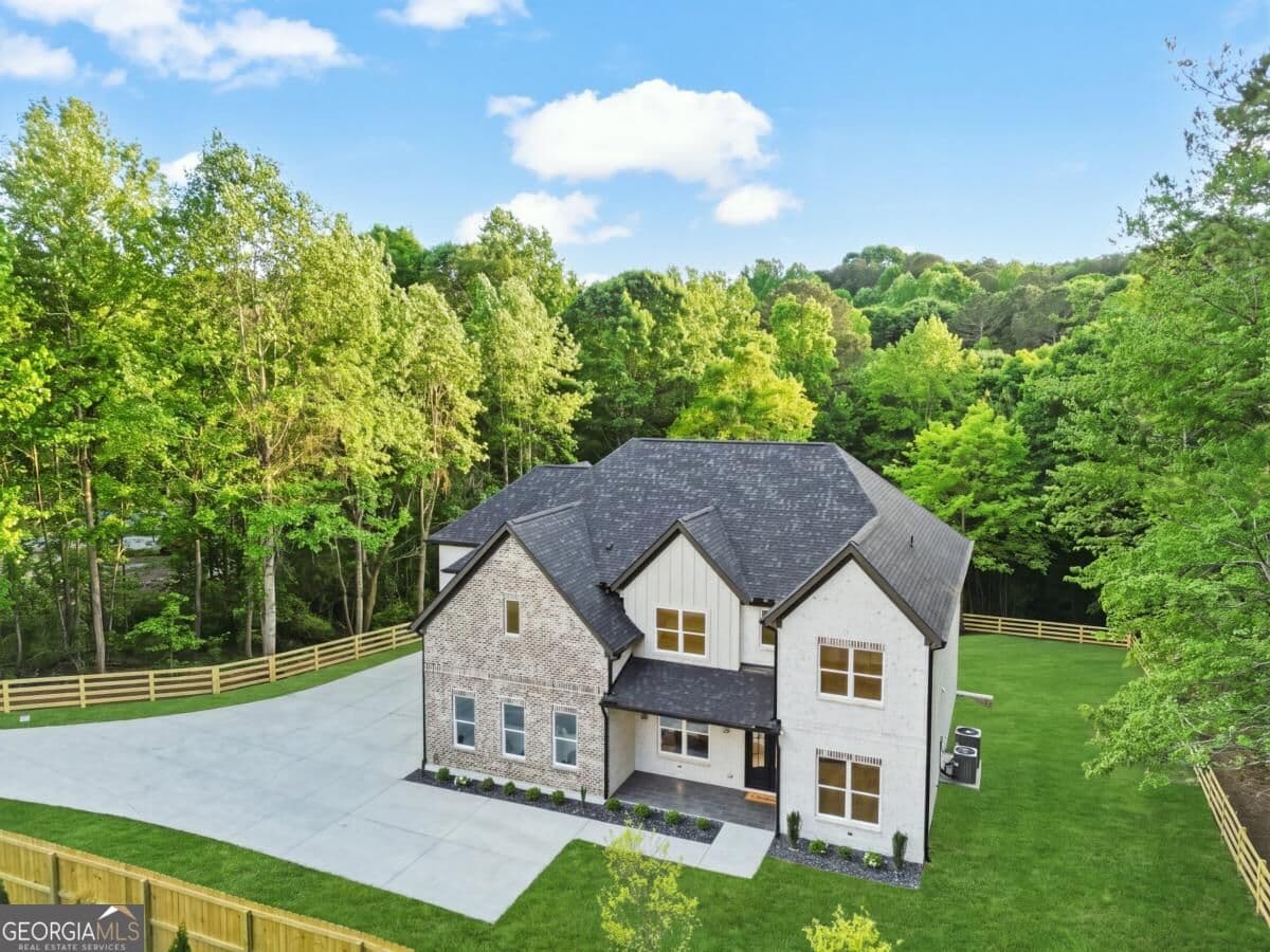 4 bedroom, 4.5 bathroom, 5,200 sq ft single family residence for sale at 3461 Callie Still Road, Lawrenceville, GA 30045 — photo 3