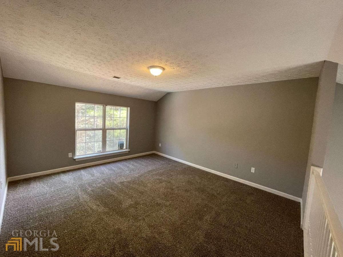 3 bedroom, 2.5 bathroom, 1,958 sq ft single family residence for sale at 2162 Anconia Circle, Lawrenceville, GA 30044 — photo 2