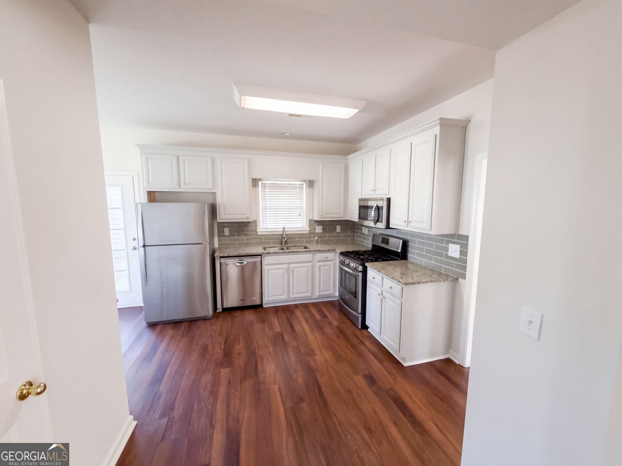 4 bedroom, 2.5 bathroom, 2,304 sq ft single family residence for sale at 12 Columns Way, Newnan, GA 30265 — photo 2