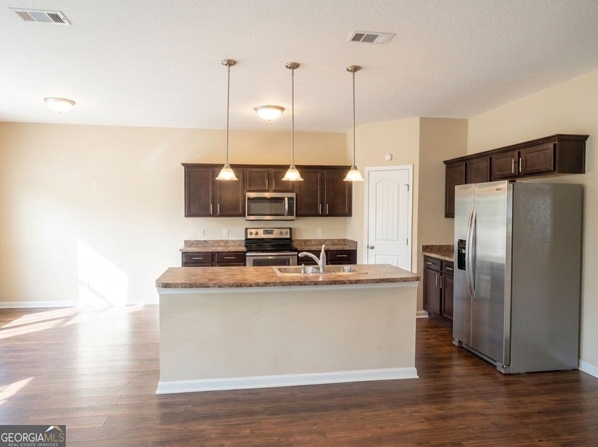 5 bedroom, 3 bathroom, 3,044 sq ft single family residence for sale at 1321 Windrow Drive, Hinesville, GA 31313 — photo 7