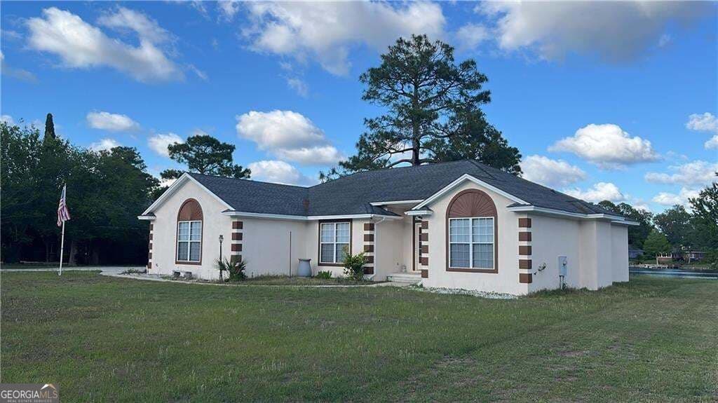 3 bedroom, 2 bathroom, 1,890 sq ft single family residence for sale at 3039 Charing Cross, Brunswick, GA 31525 — photo 2