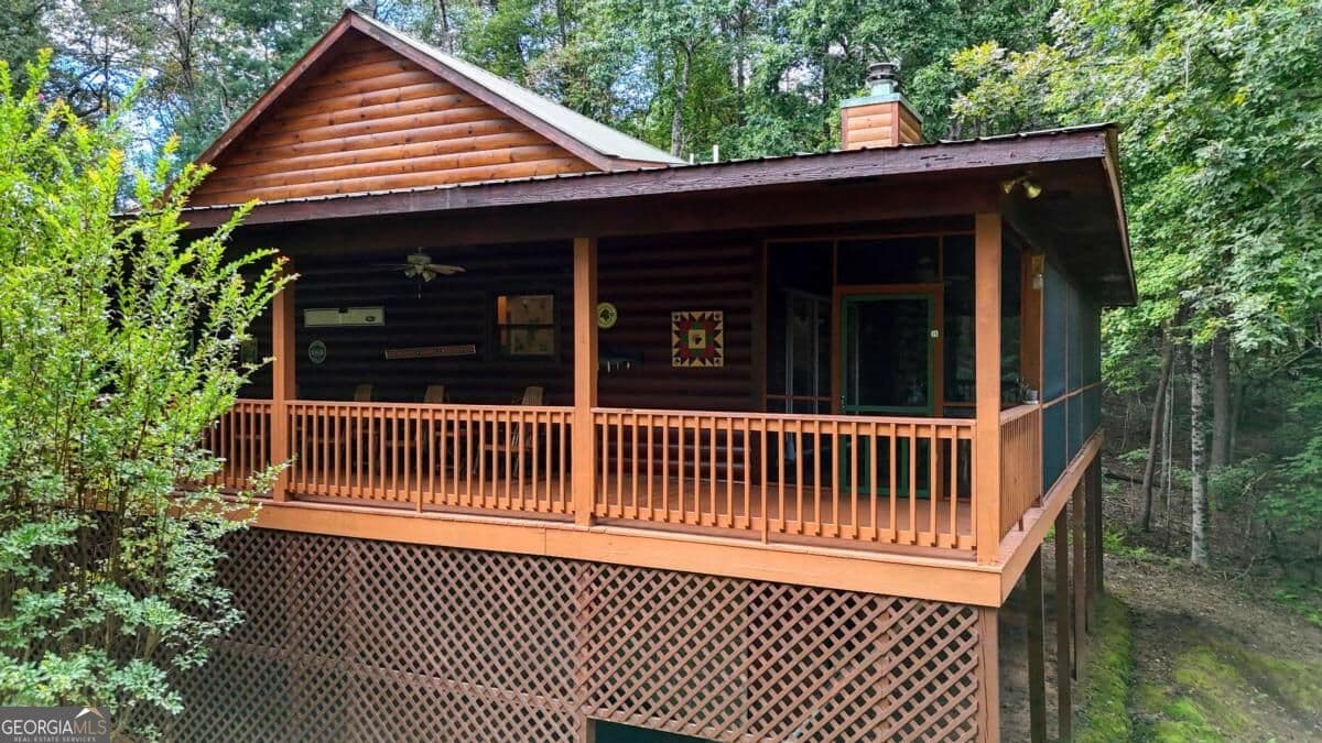 3 bedroom, 2 bathroom cabin,single family residence for sale at 364 Brasstown Hills Road, Other-North Carolina, NC 28902 — photo 6