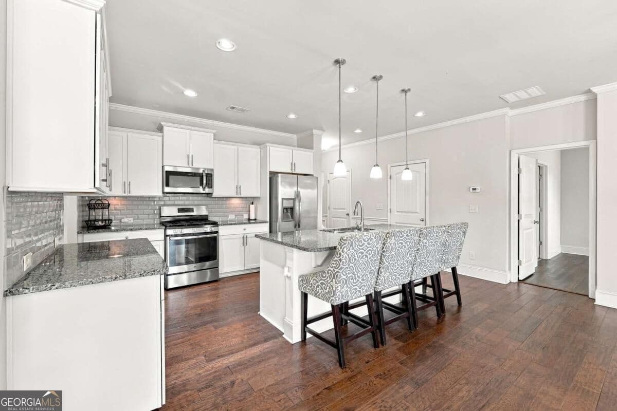 4 bedroom, 2.5 bathroom, 2,758 sq ft single family residence for sale at 6623 Rivergreen Road, Flowery Branch, GA 30542 — photo 7