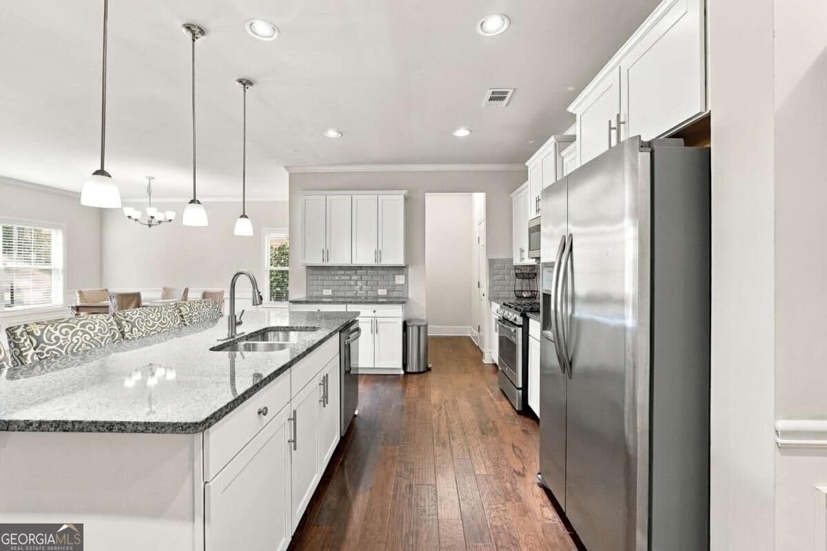 4 bedroom, 2.5 bathroom, 2,758 sq ft single family residence for sale at 6623 Rivergreen Road, Flowery Branch, GA 30542 — photo 10