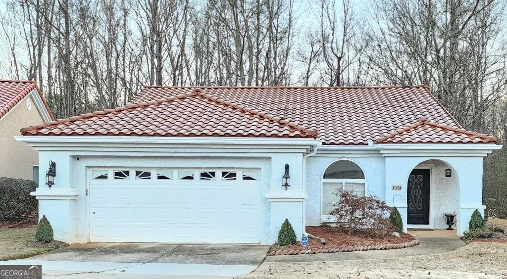 2 bedroom, 2 bathroom, 1,557 sq ft single family residence for sale at 144 Garden Walk, Stockbridge, GA 30281 — photo 1 of 14