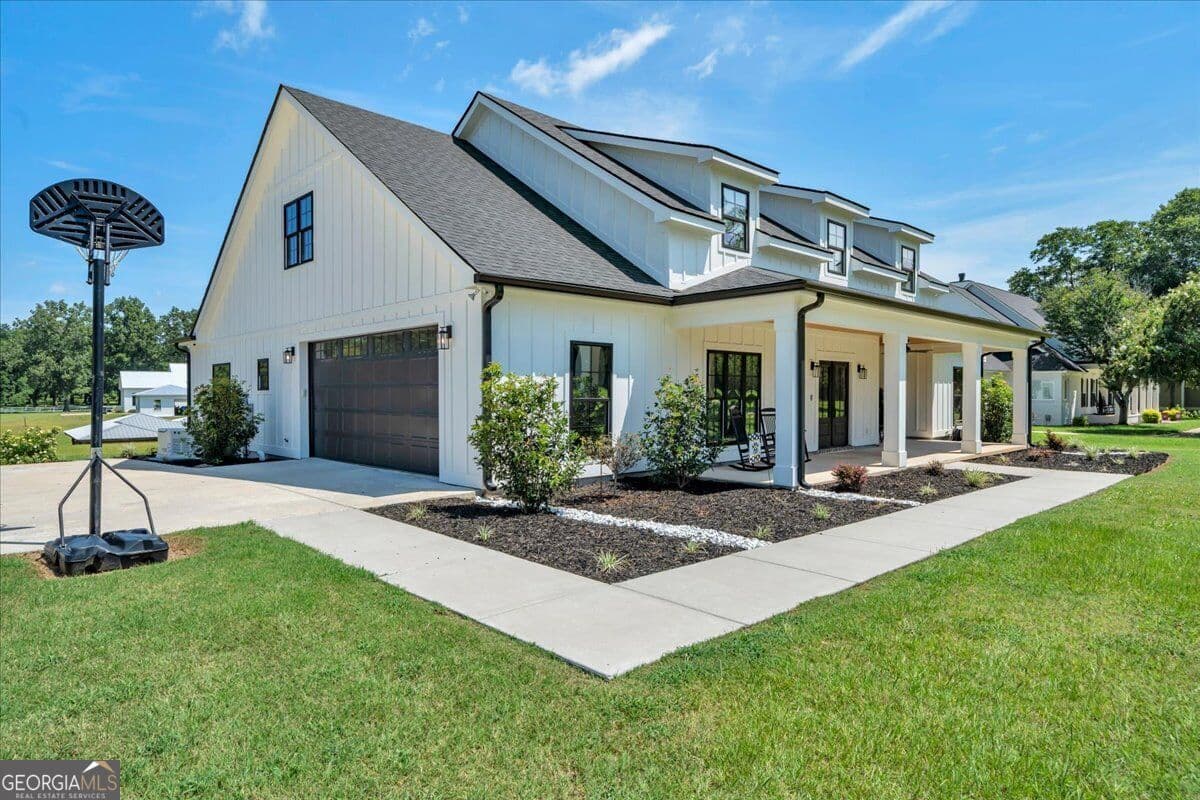 4 bedroom, 3 bathroom, 3,111 sq ft single family residence for sale at 113 Rose Lane, Cobb, GA 31735 — photo 2