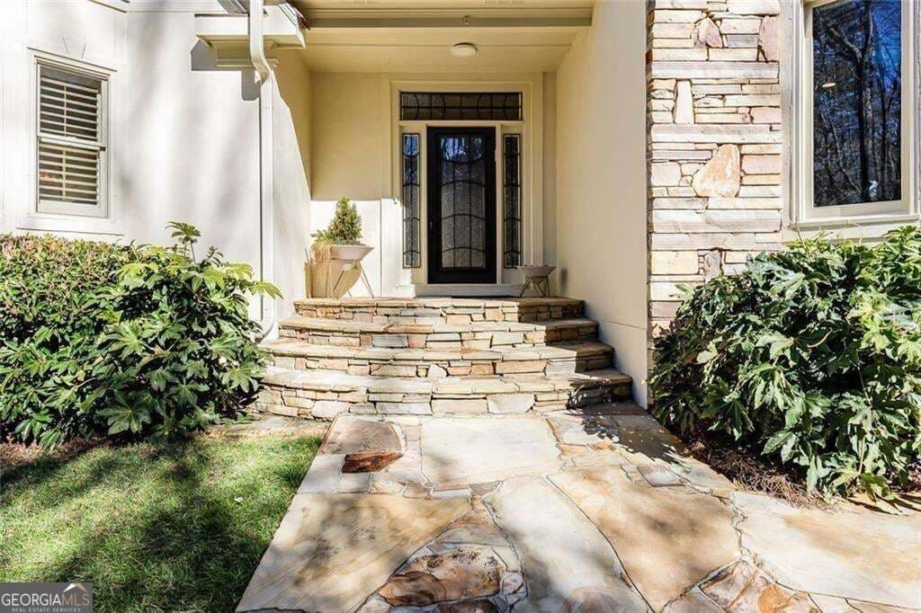 5 bedroom, 4.5 bathroom, 5,561 sq ft single family residence for sale at 325 Riverhall Court, Sandy Springs, GA 30350 — photo 2