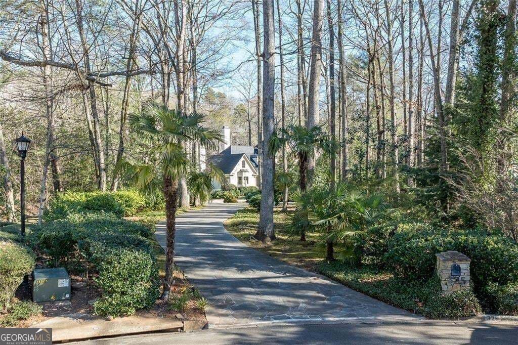 5 bedroom, 4.5 bathroom, 5,561 sq ft single family residence for sale at 325 Riverhall Court, Sandy Springs, GA 30350 — photo 3