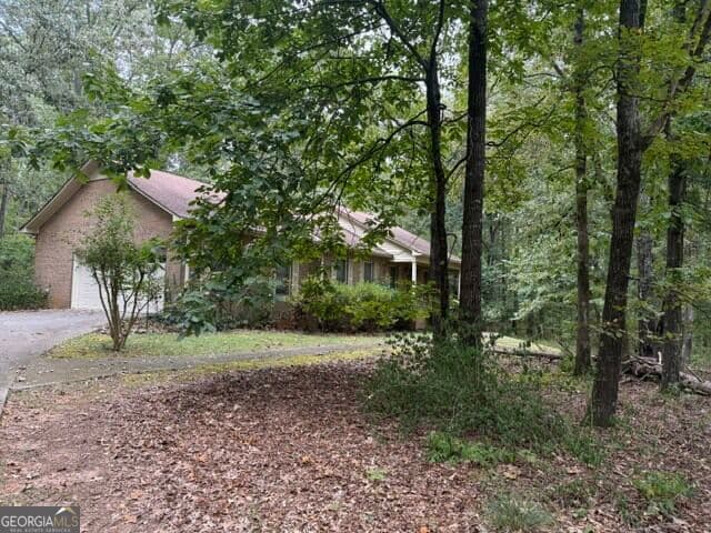 3 bedroom, 2 bathroom, 4,372 sq ft single family residence for sale at 125 Brogdon Road, Fayetteville, GA 30214 — photo 2