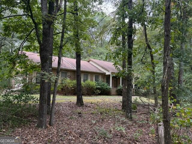 3 bedroom, 2 bathroom, 4,372 sq ft single family residence for sale at 125 Brogdon Road, Fayetteville, GA 30214 — photo 3