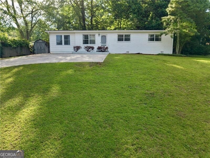 4 bedroom, 2 bathroom, 1,344 sq ft single family residence sold at 5001 Park Lane, Kennesaw, GA 30144