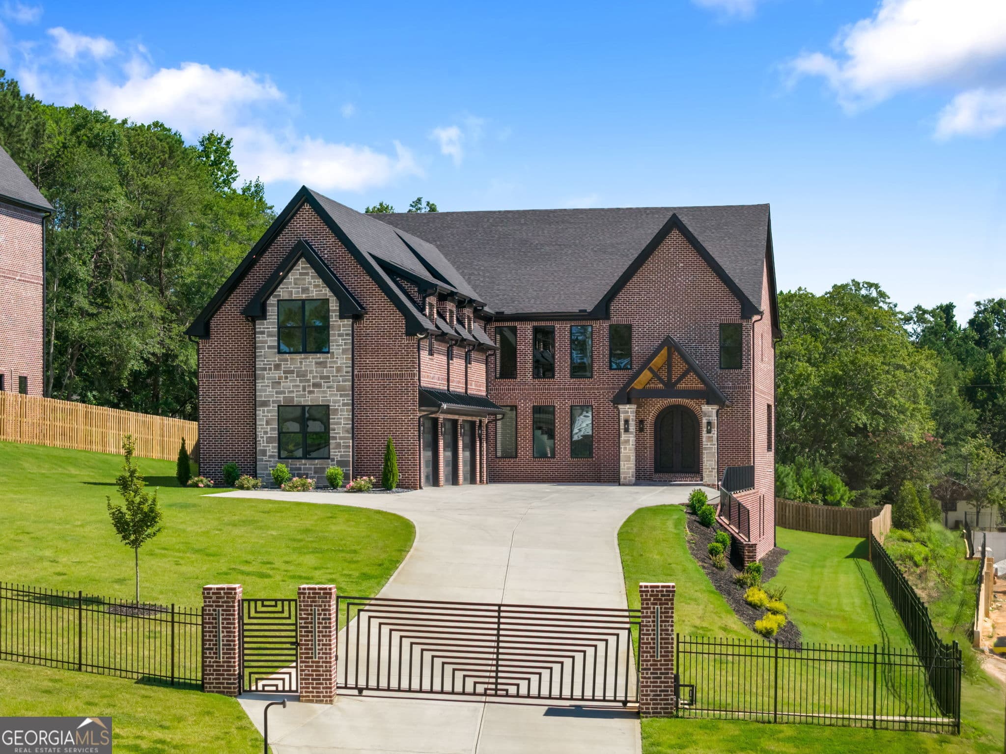 5 bedroom, 6 bathroom, 7,321 sq ft single family residence for sale at 403 Thunder Road, Buford, GA 30518 — photo 3