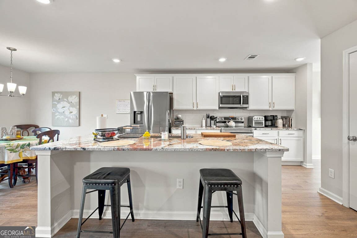5 bedroom, 3 bathroom, 2,460 sq ft single family residence for sale at 11020 Woodland Trail, Brunswick, GA 31525 — photo 9