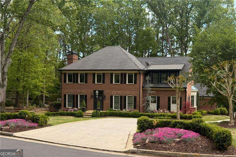 6 bedroom, 5 bathroom, 6,010 sq ft single family residence sold at 5790 Heards Forest Drive, Atlanta, GA 30328