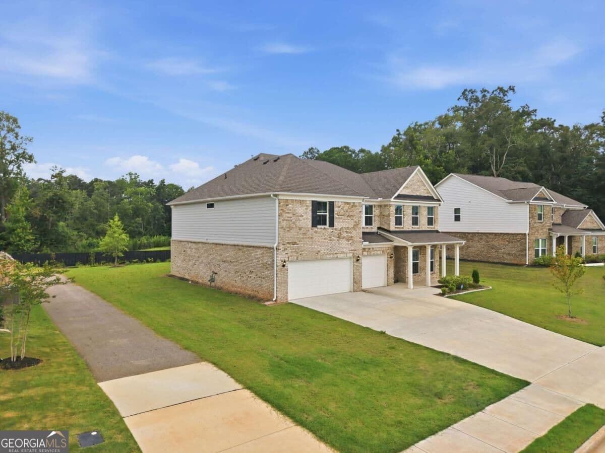6 bedroom, 4 bathroom, 4,140 sq ft single family residence for sale at 112 Aj Welch Jr Way, Mcdonough, GA 30252 — photo 3