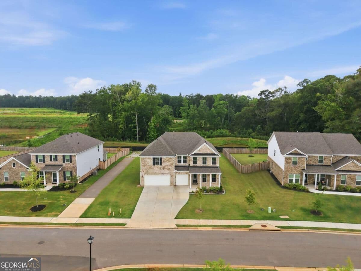 6 bedroom, 4 bathroom, 4,140 sq ft single family residence for sale at 112 Aj Welch Jr Way, Mcdonough, GA 30252 — photo 4