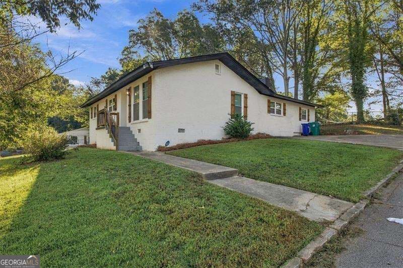 4 bedroom, 2 bathroom single family residence for sale at 2033 Boulderview Drive, Atlanta, GA 30316 — photo 2