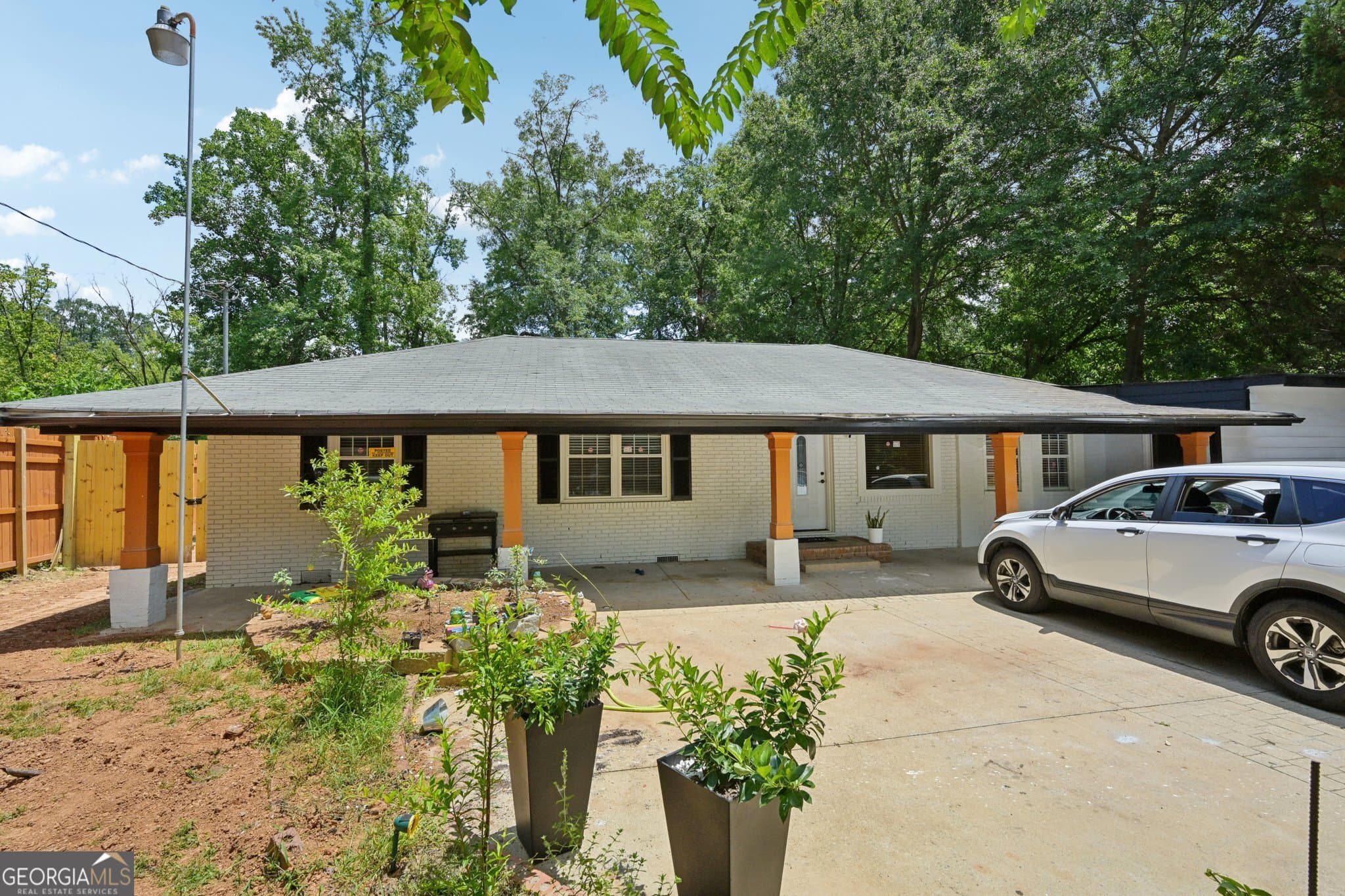 4 bedroom, 3 bathroom, 1,336 sq ft single family residence for sale at 5950 Springview Drive, Forest Park, GA 30297