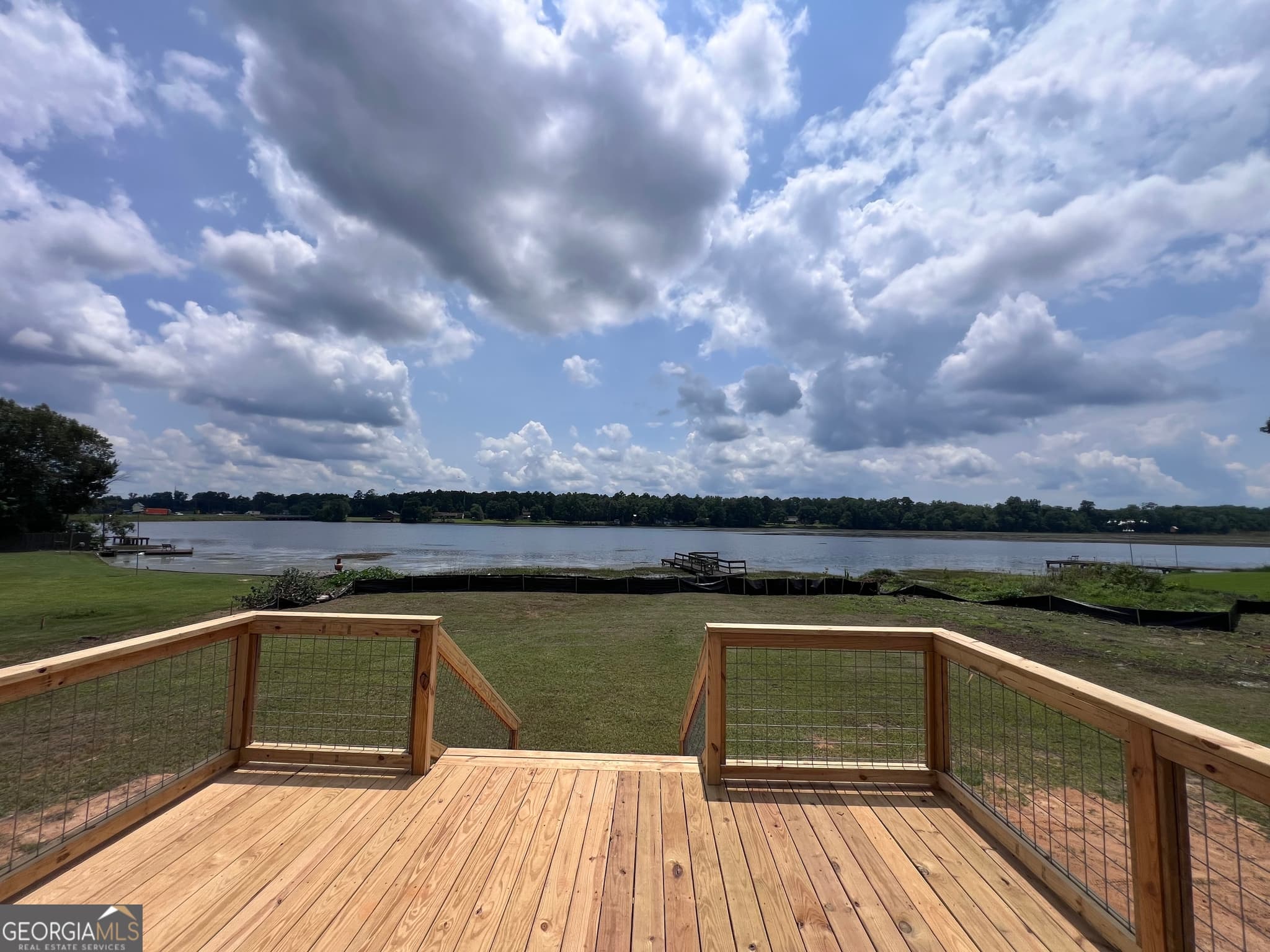 4 bedroom, 2 bathroom, 1,560 sq ft manufactured home,single family residence for sale at 105 N Lakeshore Drive, Ivey, GA 31031 — photo 2