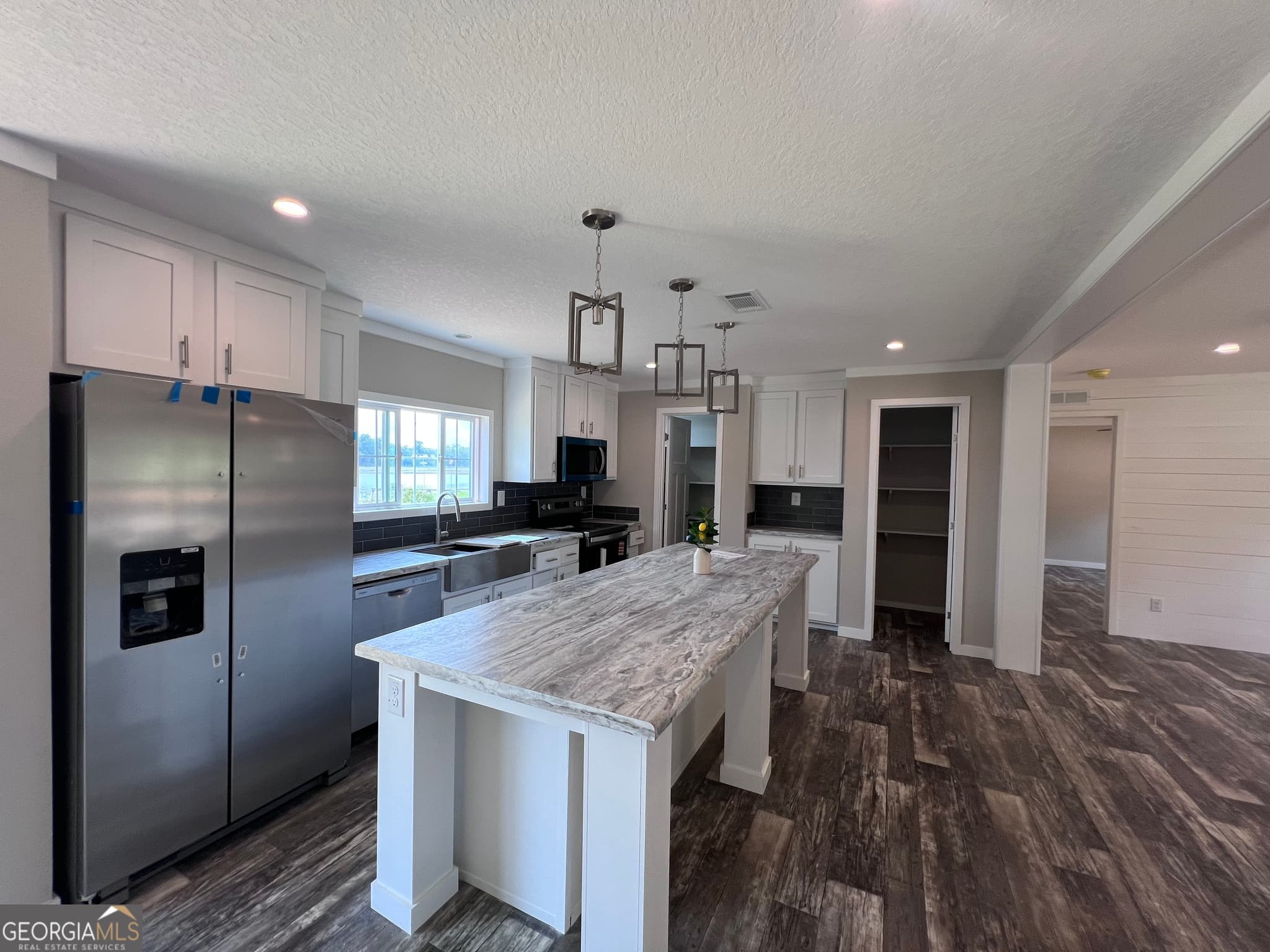4 bedroom, 2 bathroom, 1,560 sq ft manufactured home,single family residence for sale at 105 N Lakeshore Drive, Ivey, GA 31031 — photo 6