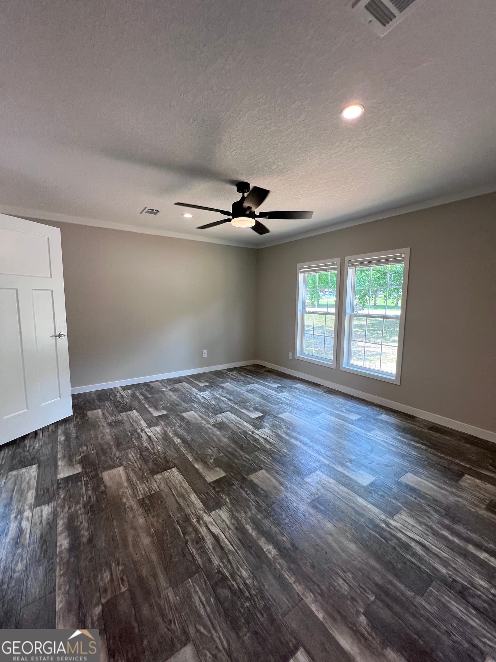 4 bedroom, 2 bathroom, 1,560 sq ft manufactured home,single family residence for sale at 105 N Lakeshore Drive, Ivey, GA 31031 — photo 10