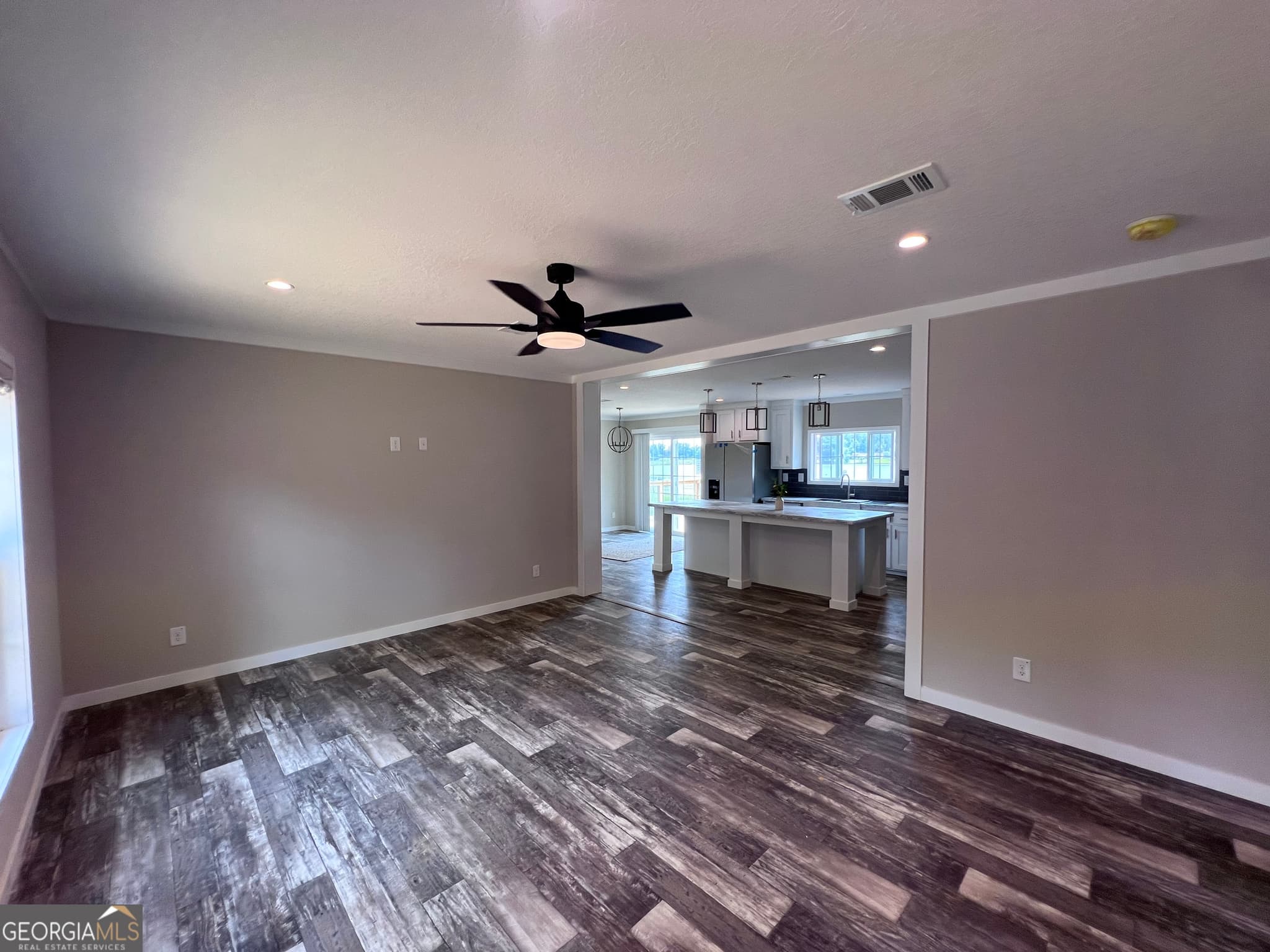 4 bedroom, 2 bathroom, 1,560 sq ft manufactured home,single family residence for sale at 105 N Lakeshore Drive, Ivey, GA 31031 — photo 4