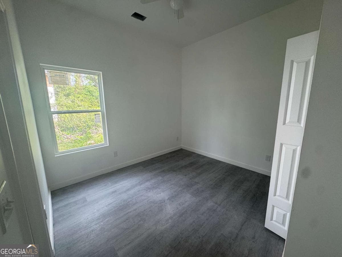 4 bedroom, 3 bathroom single family residence for sale at 6895 Magnolia Street, Lithonia, GA 30058 — photo 7