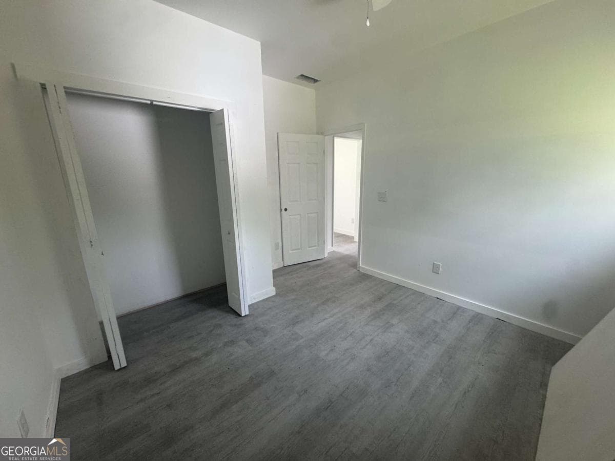 4 bedroom, 3 bathroom single family residence for sale at 6895 Magnolia Street, Lithonia, GA 30058 — photo 5