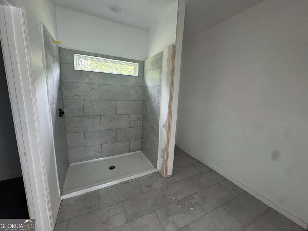 4 bedroom, 3 bathroom single family residence for sale at 6895 Magnolia Street, Lithonia, GA 30058 — photo 9