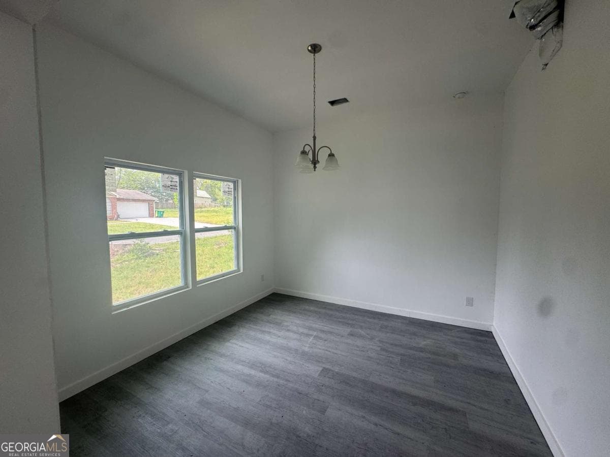 4 bedroom, 3 bathroom single family residence for sale at 6895 Magnolia Street, Lithonia, GA 30058 — photo 4