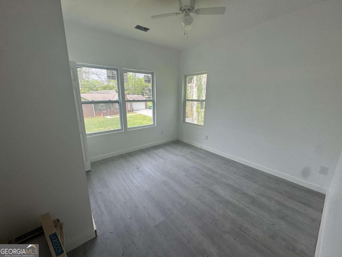 4 bedroom, 3 bathroom single family residence for sale at 6895 Magnolia Street, Lithonia, GA 30058 — photo 8