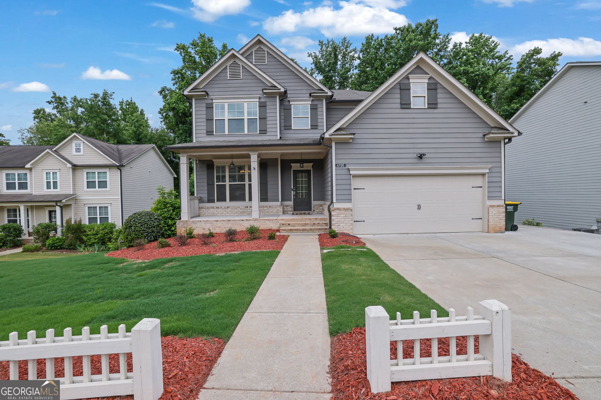 5 bedroom, 3 bathroom, 4,104 sq ft single family residence sold at 4195 Mossy Lane, Cumming, GA 30028