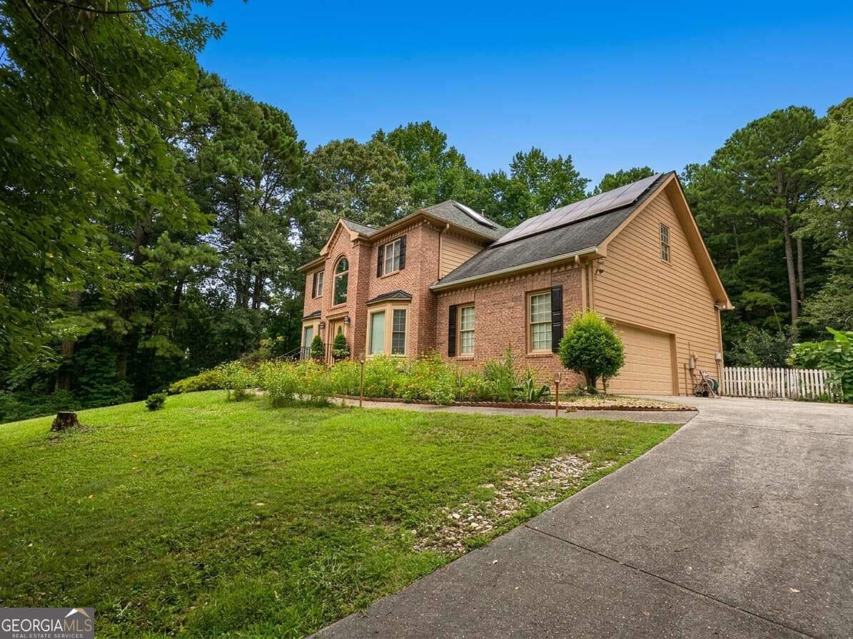 5 bedroom, 4 bathroom, 4,400 sq ft single family residence for sale at 2365 Friars Gate Drive, Lawrenceville, GA 30043 — photo 2