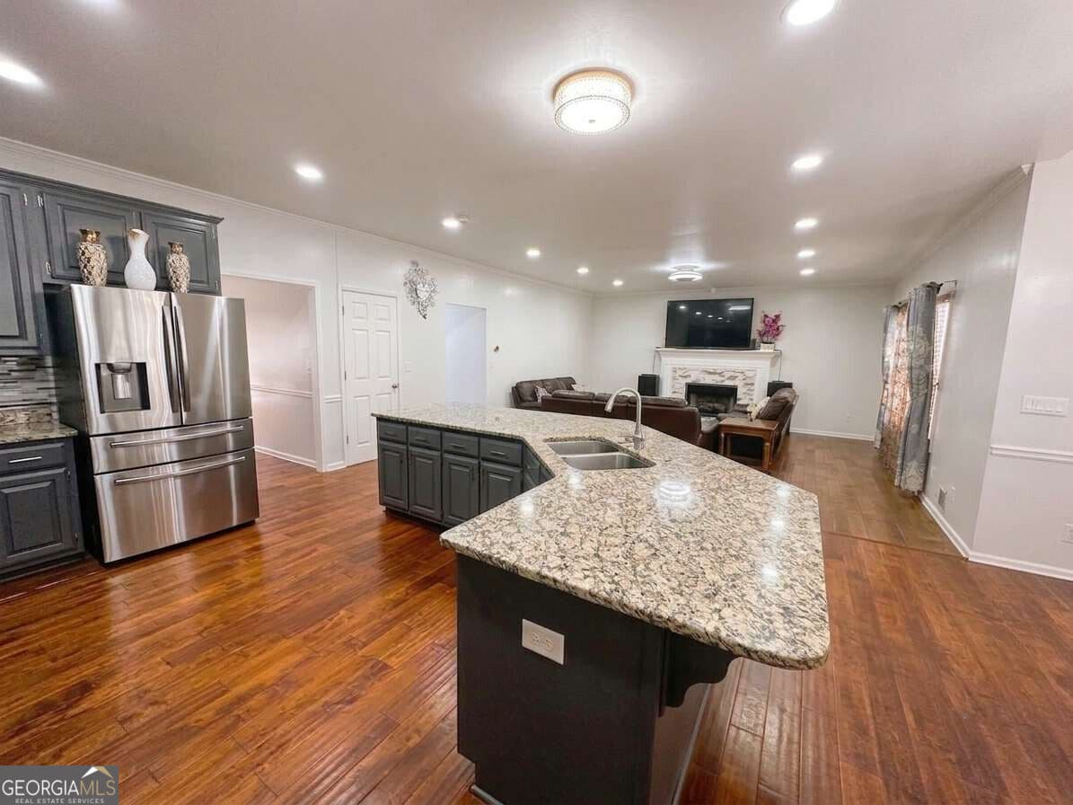 5 bedroom, 4 bathroom, 4,400 sq ft single family residence for sale at 2365 Friars Gate Drive, Lawrenceville, GA 30043 — photo 6